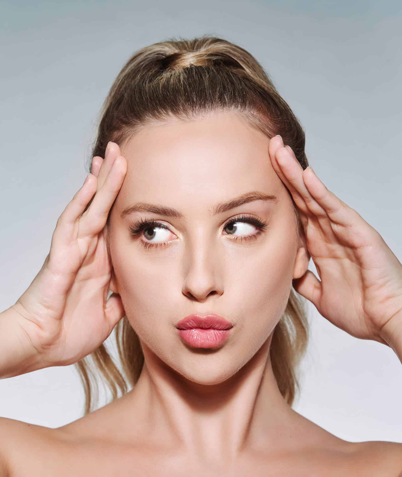 Lifestyle image of youthful client with smooth, glowing skin after neuromodulator treatment at Allure Aesthetics in King of Prussia